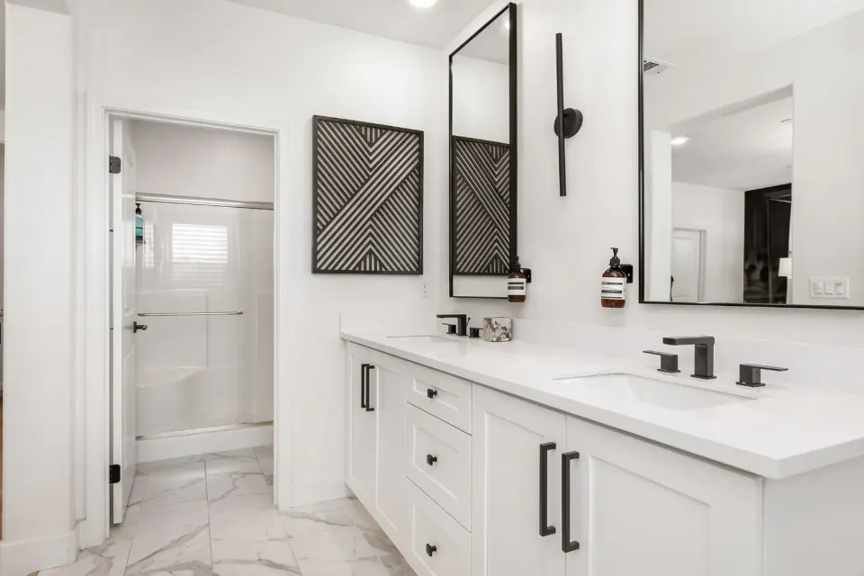 White bathroom with marble-look floor tiles