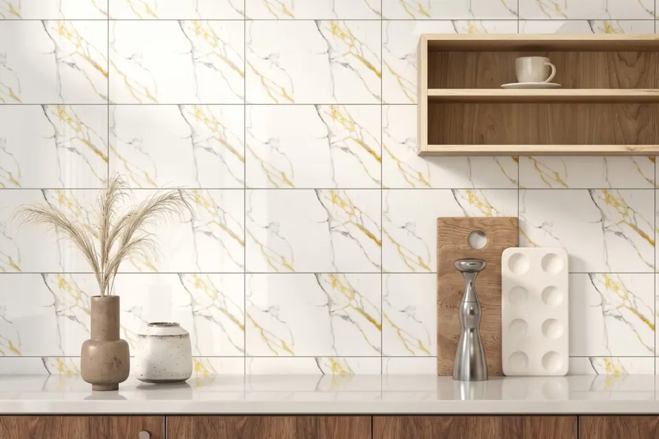 Gold-veined marble wall tiles in a kitchen